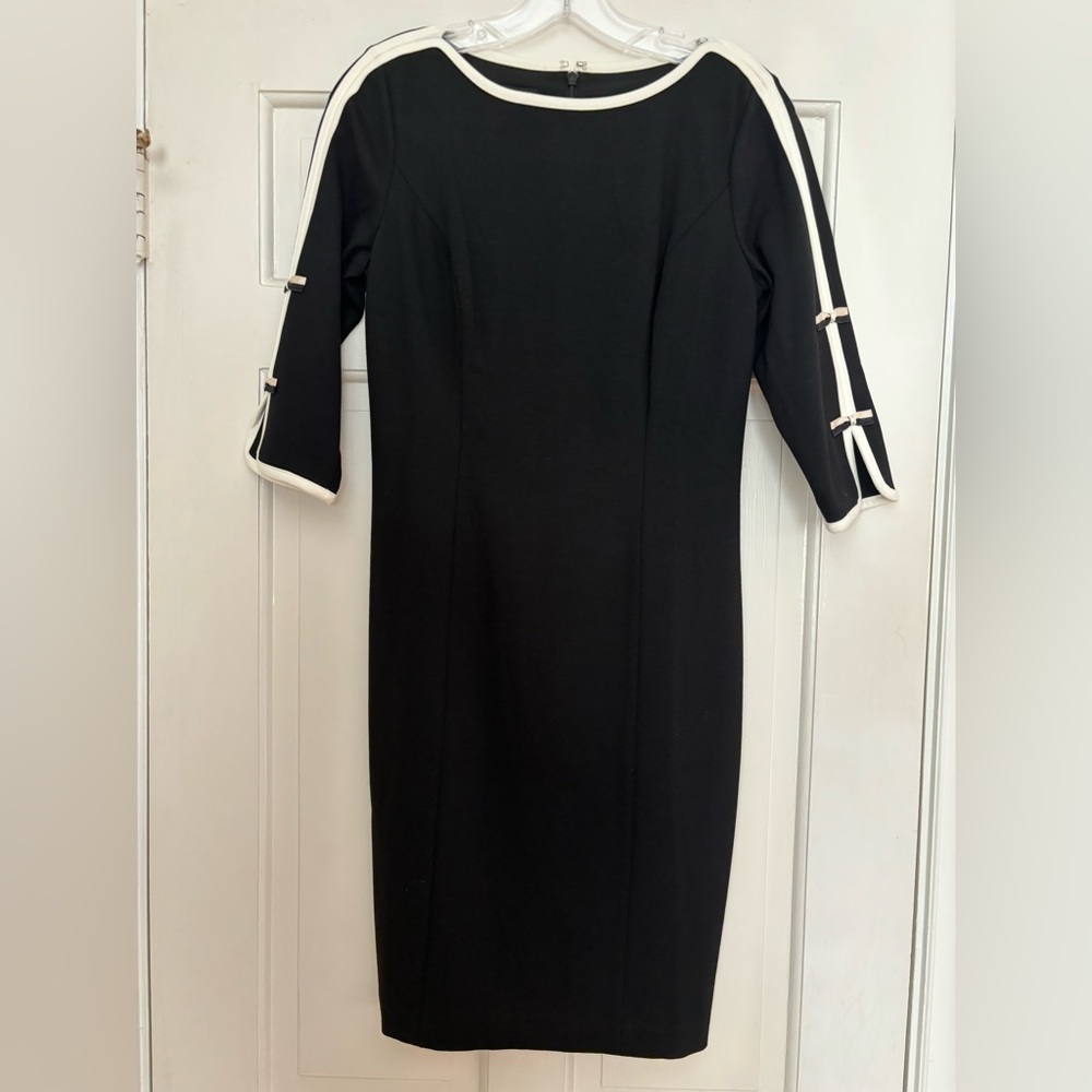 Talbots black dress size 2P with cute white bow detail on sleeves